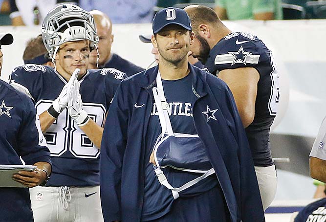 Injured Dallas Cowboys quarterback Tony Romo watches from the sidelines during the second half of an NFL football game against the Philadelphia Eagles, Sunday, Sept. 20, 2015, in Philadelphia. (AP Photo/Michael Perez)